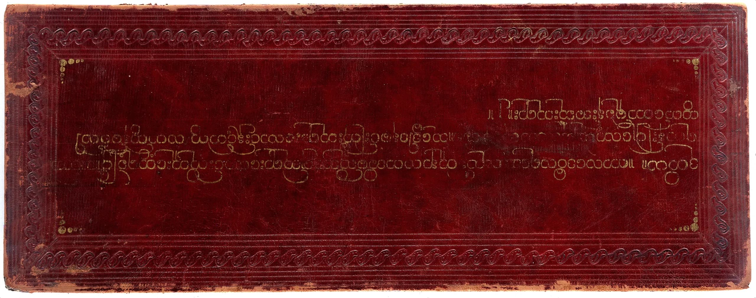 Gold-tooled red leather binding
